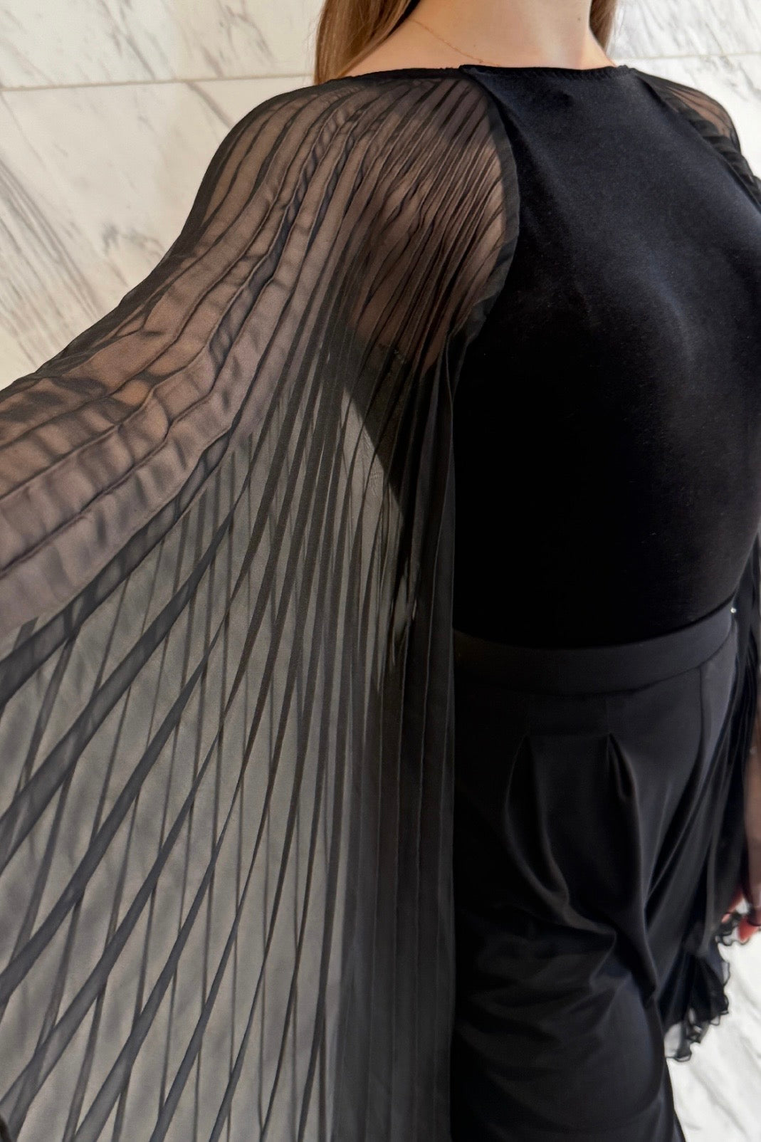 Black velvet leotard with corrugated wings