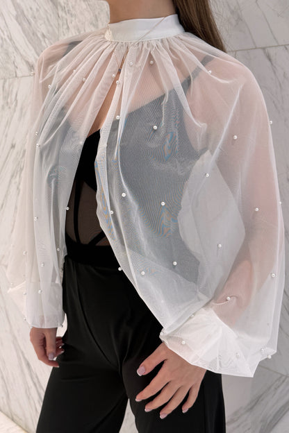 White cape with pearls