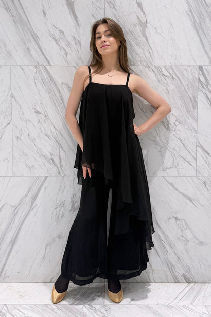 Jumpsuit with an asymmetrical top