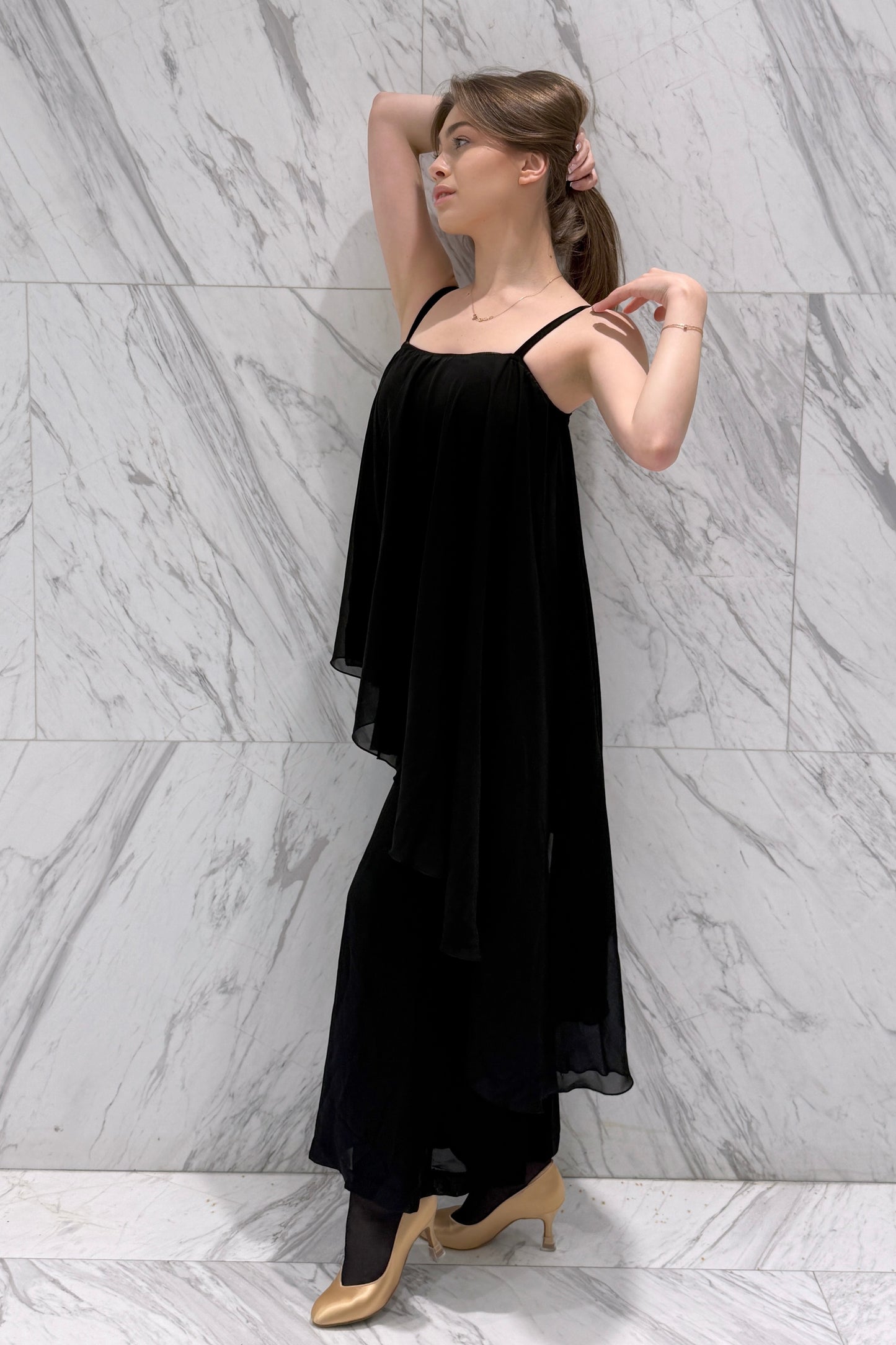 Jumpsuit with an asymmetrical top