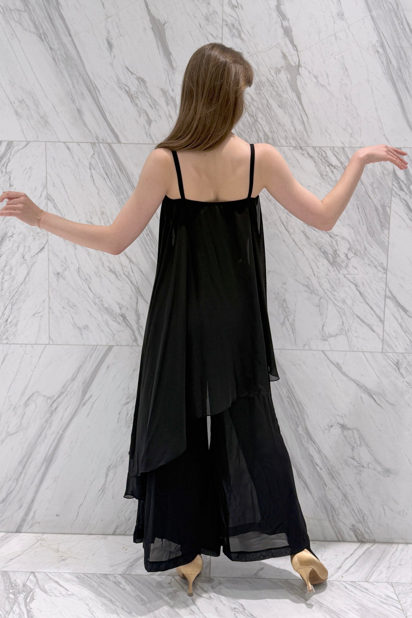 Jumpsuit with an asymmetrical top