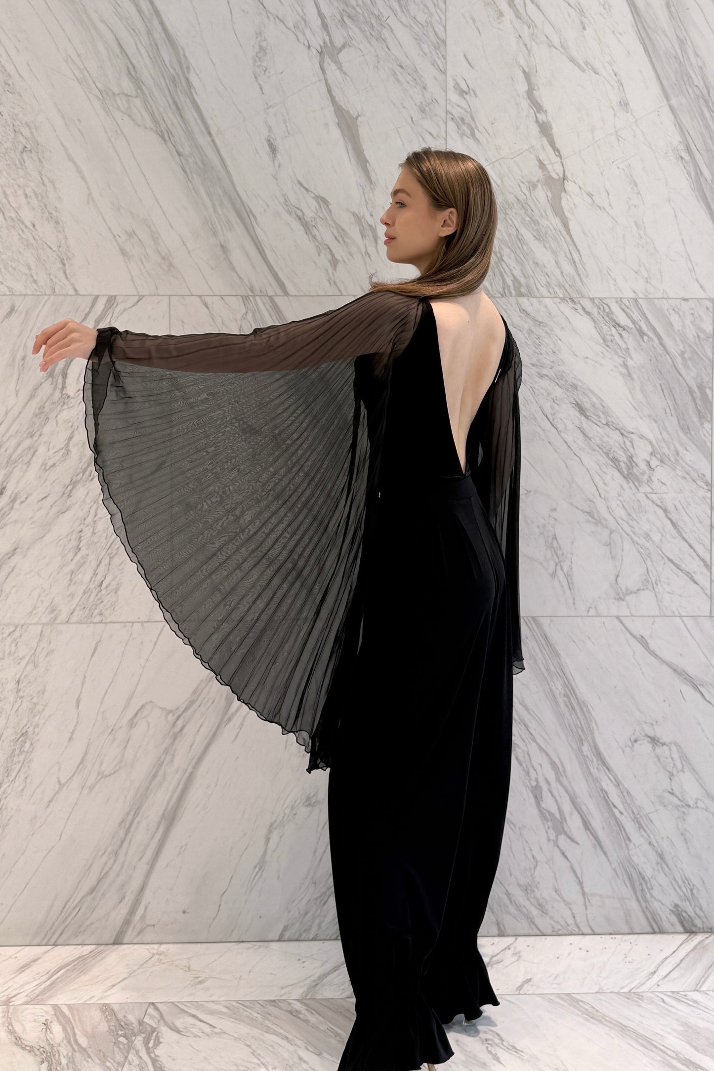 Black velvet leotard with corrugated wings