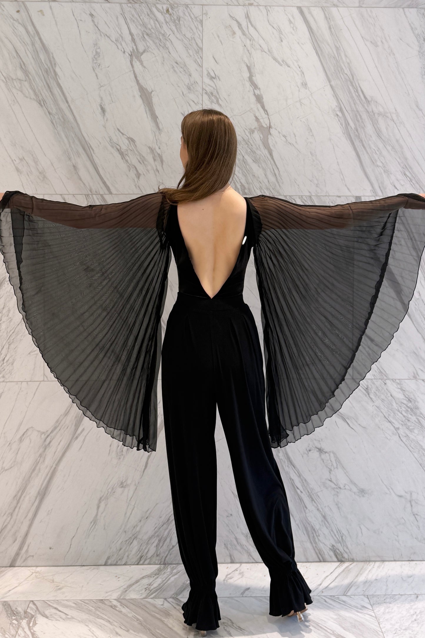 Black velvet leotard with corrugated wings