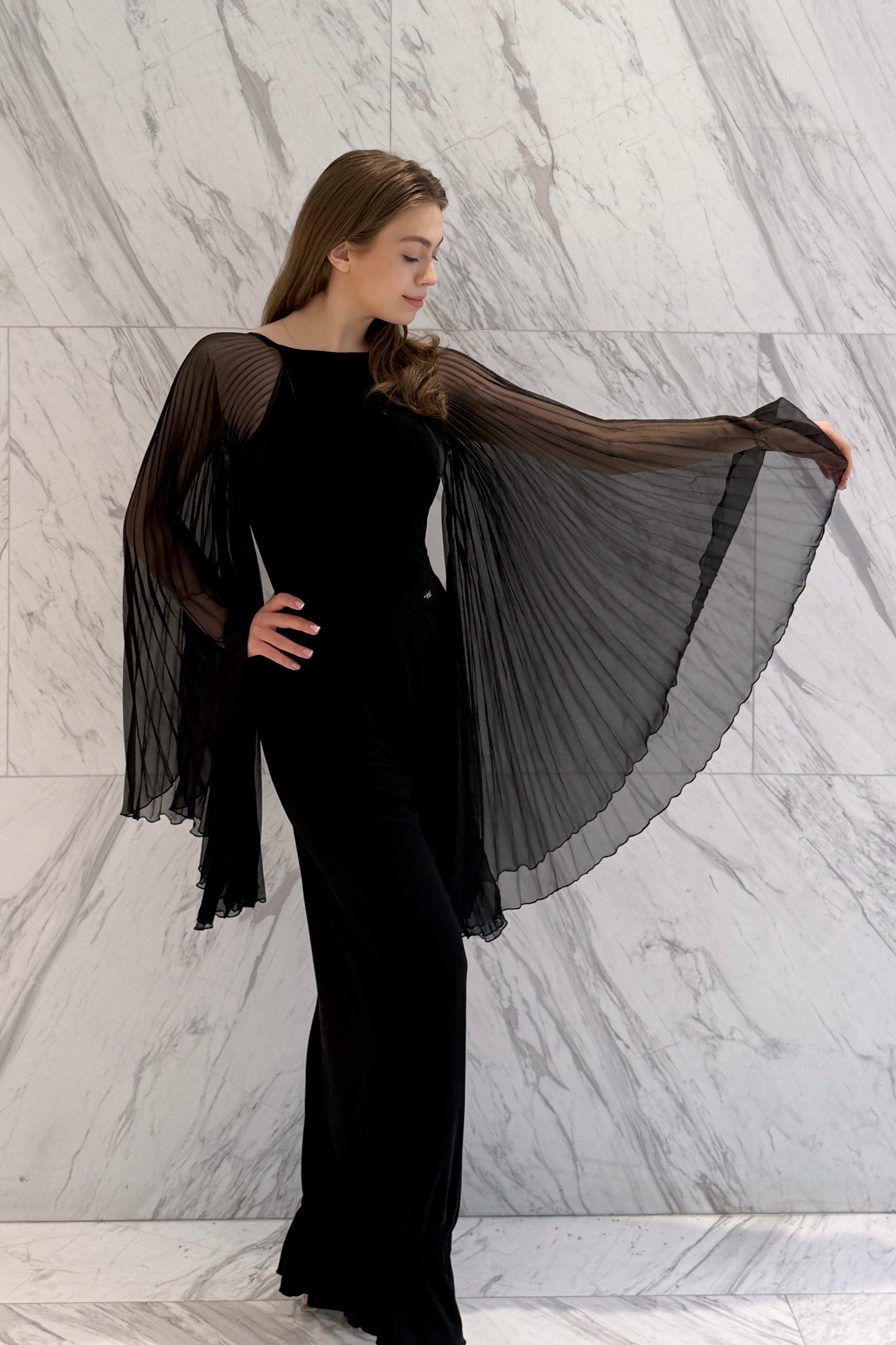 Black velvet leotard with corrugated wings