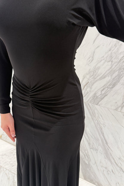 Black biflex ballroom dress with voluminous sleeves and an asymmetrical skirt