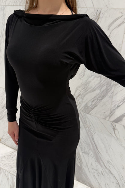 Black biflex ballroom dress with voluminous sleeves and an asymmetrical skirt
