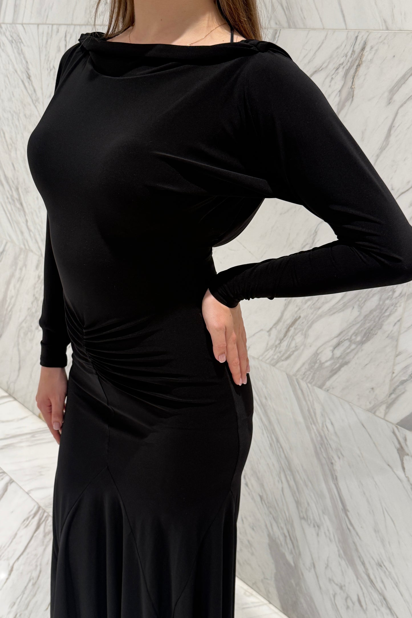 Black biflex ballroom dress with voluminous sleeves and an asymmetrical skirt