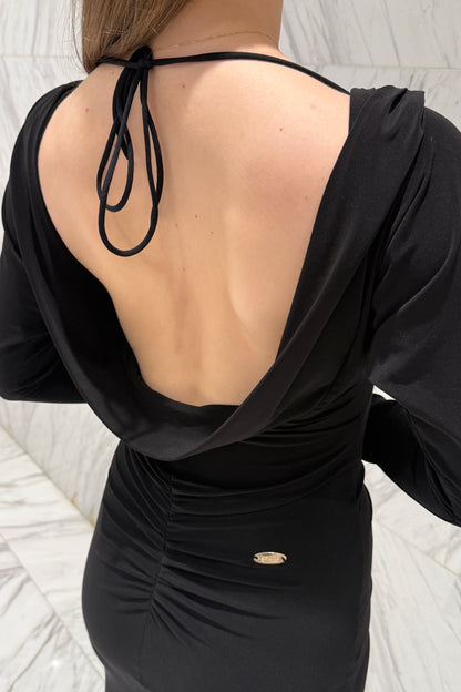 Black biflex ballroom dress with voluminous sleeves and an asymmetrical skirt